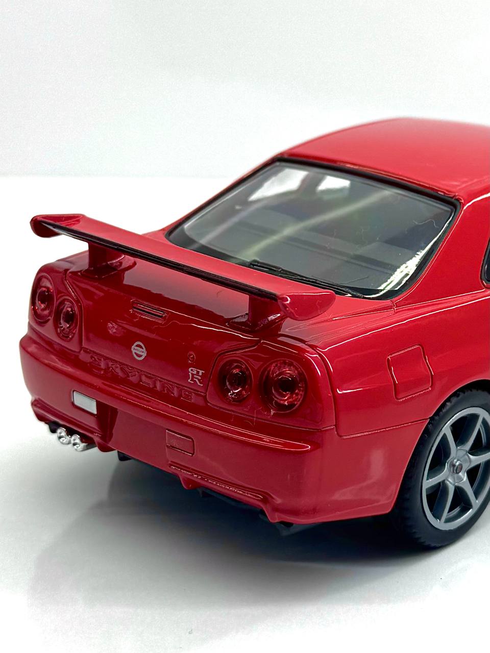 ماکت ماشین فلزی نیسان جی تی آر (Nissan Skyline GT‑R R34) ویلی مقیاس 1.24