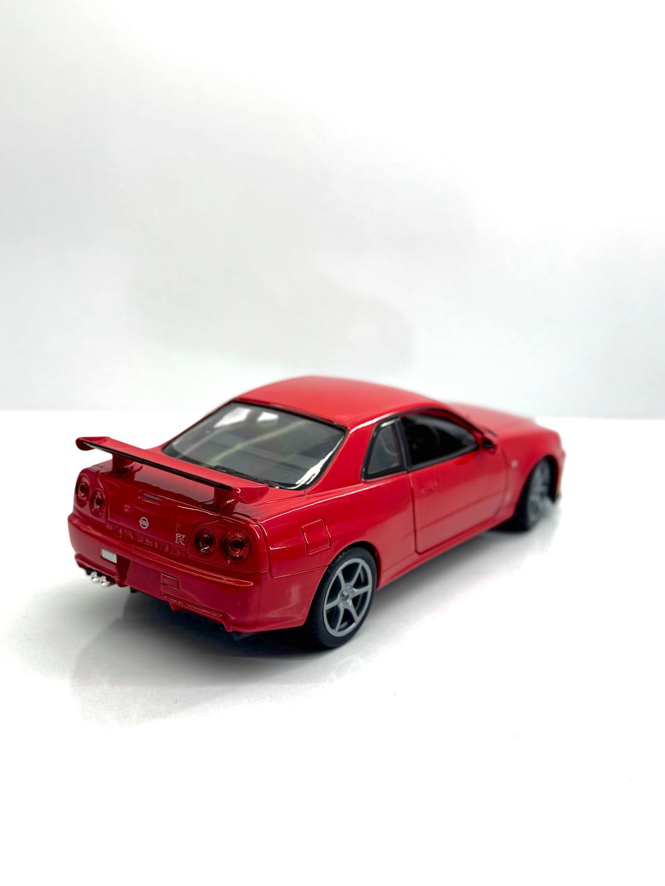 ماکت ماشین فلزی نیسان جی تی آر (Nissan Skyline GT‑R R34) ویلی مقیاس 1.24