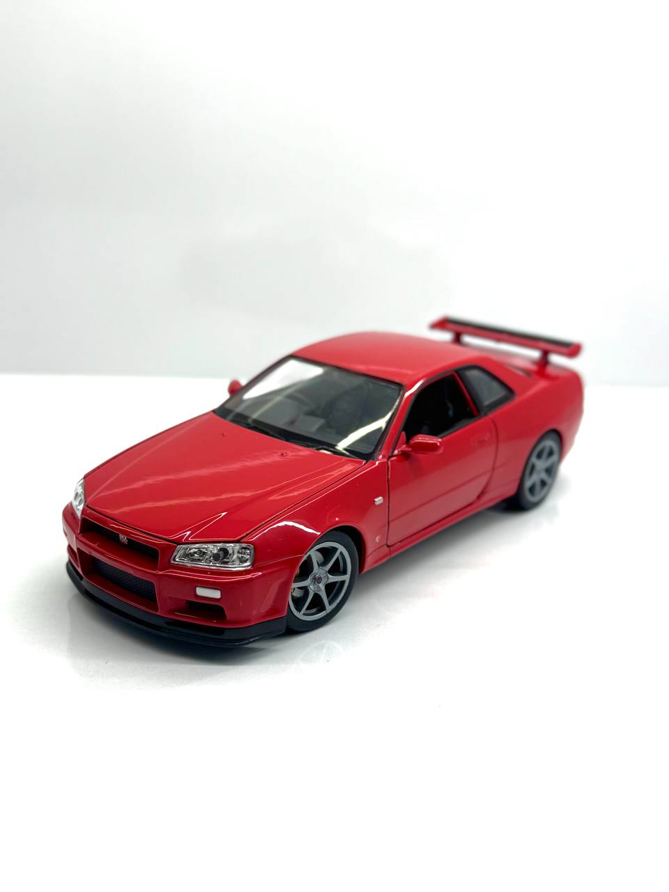 ماکت ماشین فلزی نیسان جی تی آر (Nissan Skyline GT‑R R34) ویلی مقیاس 1.24